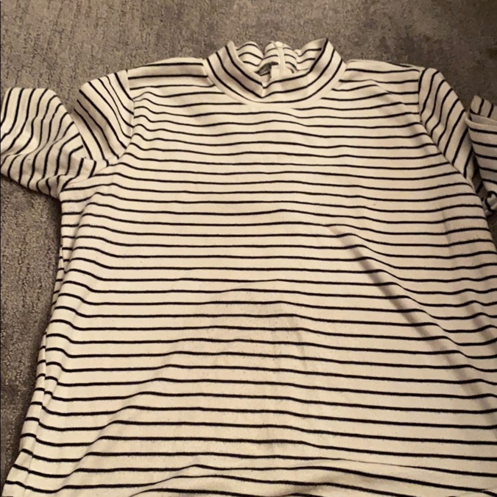 a turtle neck shirt